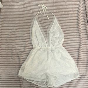 Beautiful white lace low cut romper